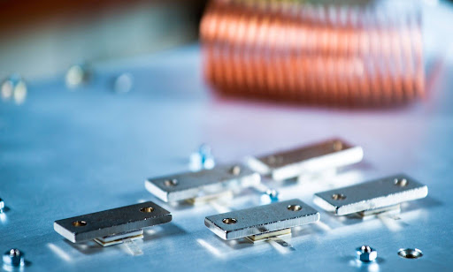 RF microwave boards on a test bench where Wilkinson power divider specs like insertion loss are measured